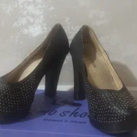 کفش مجلسی|کیف، کفش، کمربند|شیراز, ملاصدرا|دیوار