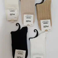 جوراب بالا زانو گندمی|لباس|قم, بنیاد|دیوار