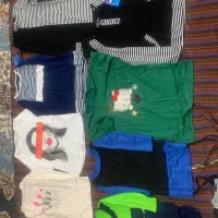 چند تکه لباس نو یکجا