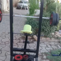 دوچرخه ثابت و دستگاه پرس سینه