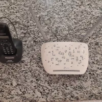 فروش مودم وگوشی بی سیم کارکرده درحد به دلیل مهاجرت