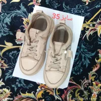 شلوار پسرانه و کتونی دخترانه