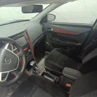 دنا پلاس اتوماتیک مدل 1400|خودرو سواری و وانت|قم, دروازه چوبی|دیوار