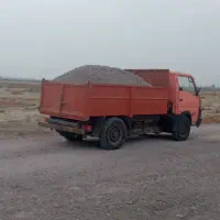 نیسان خاور کمپرسی زیردرختی