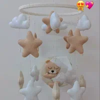 سفارش آویزه گهواره موزیکال نمدی