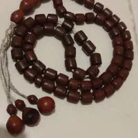 تسبیح بذرالبنج فوق کهنه وگردنبد عاج