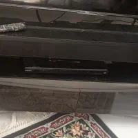 دو عدد صندلی با دو عدد میز عسلی وبخاری