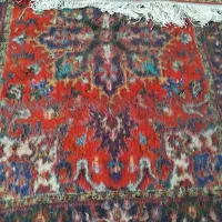 یک تخته فرش قالیچه از دار افتاده