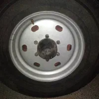 لاستیک و رینگ ترک ۸  میل نیسان