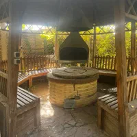 اجاره کلبه چوبی|اجارهٔ کوتاه‌مدت ویلا و باغ|هشتگرد, کوشک زر|دیوار