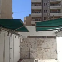 سایبان برقی.بالابر فروشگاهی هیدرولیک