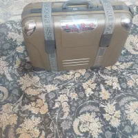 چمدان‌مسافرتی در حد نو