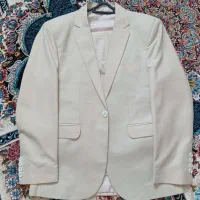 یک دست کت شلوار