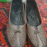 کفش زنانه|کیف، کفش، کمربند|رشت, فلسطین|دیوار