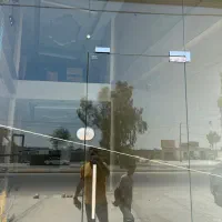 شیشه سکوریت ‌کرکره برقی