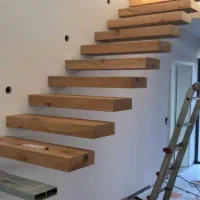 طراحی ساخت اجراء انواع پله معلق محور وسط دومحور|خدمات پیشه و مهارت|رشت, کوی حسینی|دیوار