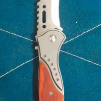 چاقومعاوضه بادنده ای همراه با چراغ قوه نور قوی