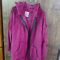 چندتا لباس   بارانی و و پانچ وهودی