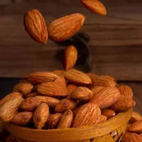 شکستن  بادام و سورت توسط دستگاه های صنعتی