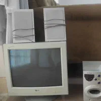 کامپیوتر به همراه باند و اسپیکر