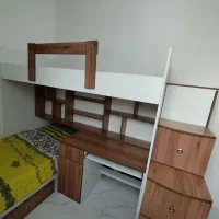 تخت دو طبقه درحدنو همراه با کتابخانه،میز،کمد و کشو