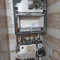 لوله کشی پکیج رادیاتور آبگرمکن پمپ و منبع