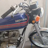 موتور ۱۲۵هوندا آبی|موتورسیکلت|میانه, |دیوار