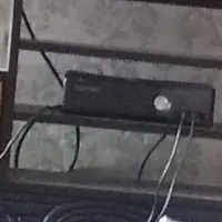 ایکس باکس 360  همراه فرمان کینکت است و با دو دسته