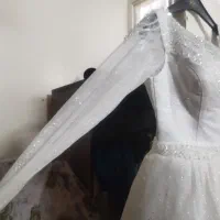 لباس عروس|لباس|رباطکریم, کیکاور|دیوار