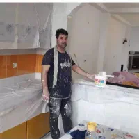 نصب ایزوگام دیوار با دستگاه وینچ نقاشی ساختمان