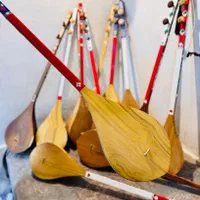 دمبوره هزارگی و قطغنی|سازهای سنتی|باقرشهر, |دیوار