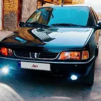 پژوSLX مشکی متالیک. بدون رنگ، عروسک