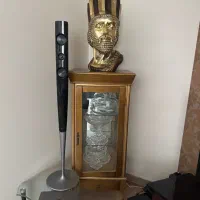 بوفه سه طبقه یه کشو دارد جنس کاملا چوب،