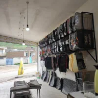 تولیدی روکش خودرو چرم دوزی.