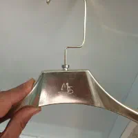 چوب لباس طلایی