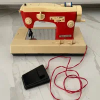 عروسک باربی چرخ خیاطی