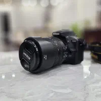 نیکون D5600 + لنز 18-140 VR و 50mm f/1.8G
