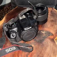 کنون ۱۳۰۰ با لنز