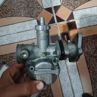 کاربرات و اگزوز باتری 125