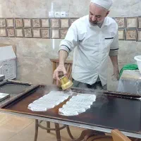 کارگر خانم  آشنا به کار رشته خشکار و کاکا