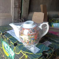 قوری چایی چینی ونعلبکی چینی