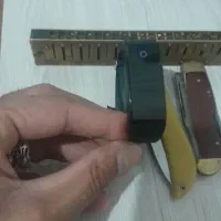 ساز دهنی قدیمی برنجی چاقو ساعت هوشمند فلش