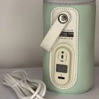 شیر گرمکن شیشه شیر کودک