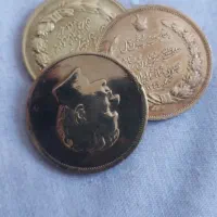 سکه نقره و مدال برنزی