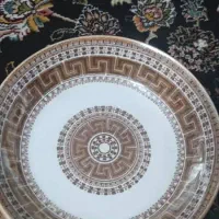 بشقاب قدیمی ورساچه تو گود