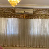 پرده سالن به همراه کتیبه و زیر پرده