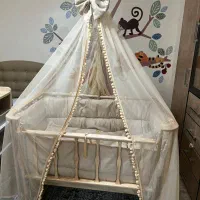گهواره تخت کنار مادر چوبی مدل فرشته مارک آنجل لند