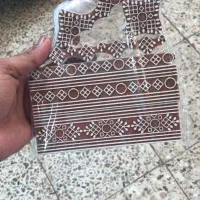 دوزنده موسوم و تپه زن|لباس|زابل, |دیوار