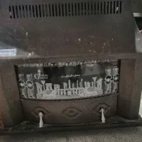 بخاری نفتی طرح شومینه