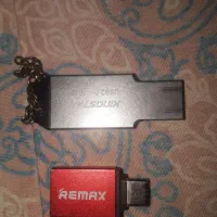 فلش ۱۶ به همراه یک تبدیل او تی جی